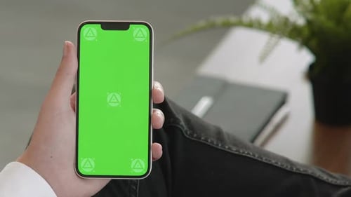 Man Using Green Screen Phone - 2K