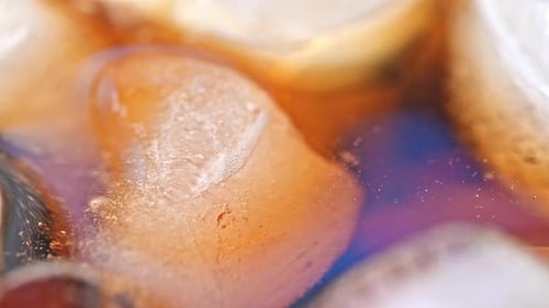 Ice cubes in soda drink