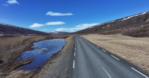 Aerial view of winding road and mountains, Iceland.