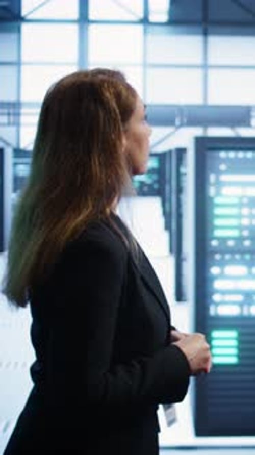 Vertical Video IT Professional Supervising Data Center Workplace Checking Hardware