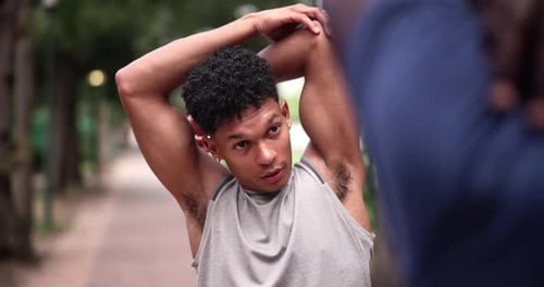 Nature, sports and man stretching arms for exercise in outdoor park, field or garden