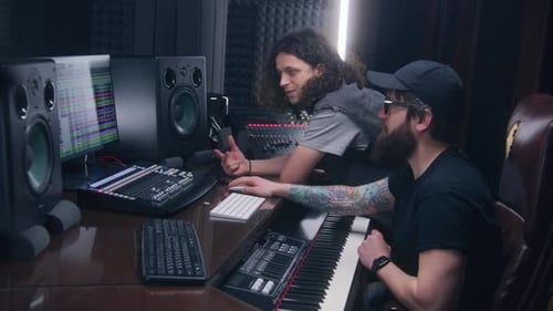 Sound Engineer and Singer Create Song on Computer