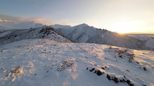 Snowy Mountains at Sunset in Winter