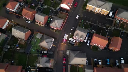 Fire Truck Responding in Suburban Neighborhood Aerial View