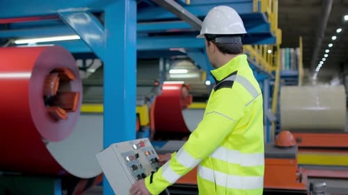 Technical Engineer Man Electrician at Factory Worker Control Panel Electrical Monitor Maintenance