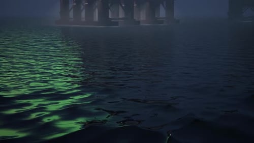 Amplíe la enorme instalación en alta mar en el océano bajo el cielo nocturno Aurora