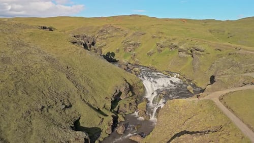 Aerial View Of Mountain River Flowing Through A Canyon In Iceland