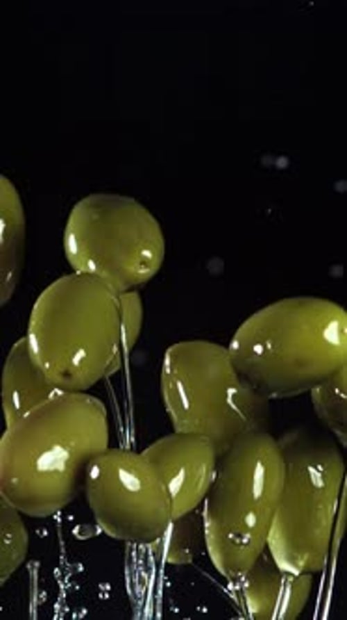 The Olives Fly Up and Fall Down Filmed on a Highspeed Camera at 1000 Fps