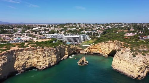 Luxurious Coastal Resort Nestled Between Dramatic Limestone Cliffs and Turquoise Waters in Olhos De