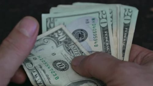 counting money, dollar money. counting cash