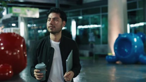 Casual Person Discovering Central District with Laptop Man Slowly Moving By Street After Working Day