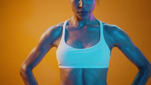 Fit young woman training in the gym