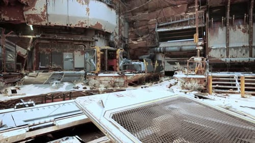 An Abandoned Building with Broken Windows and a Sense of Decay and Neglect