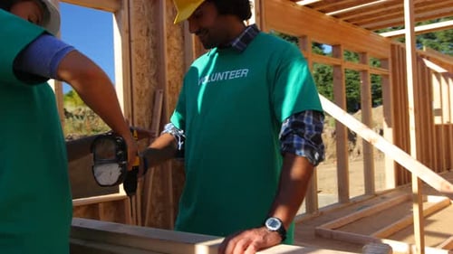 Volunteers united building homes for a better future in their community