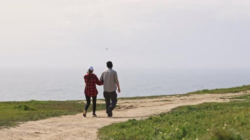 A Couple Walking Outdoor