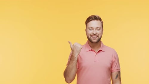 Expressive Young Man Over Vibrant Background Studio Portrait of Handsome Person