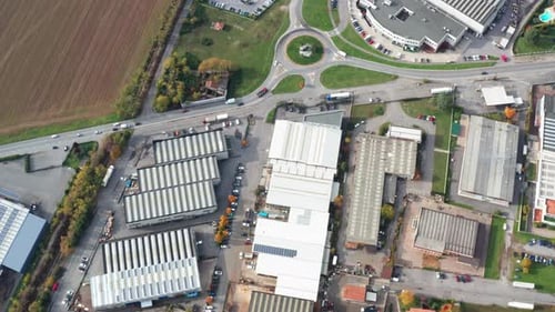 Top down aerial view of Industrial aera. Drone view of warehouse production facilities