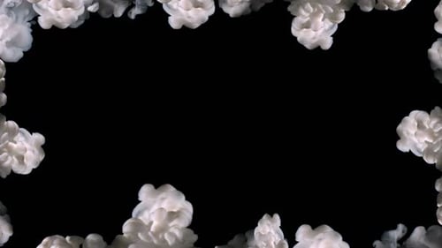 White billowing smoke cloud on a dark background