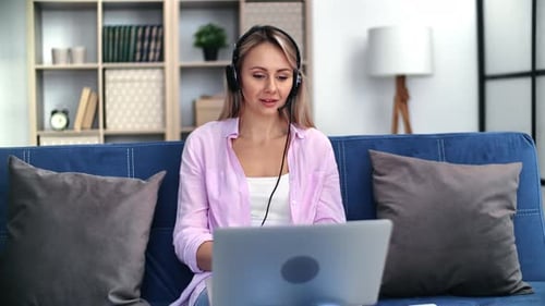 Woman on Laptop Video Call From Home