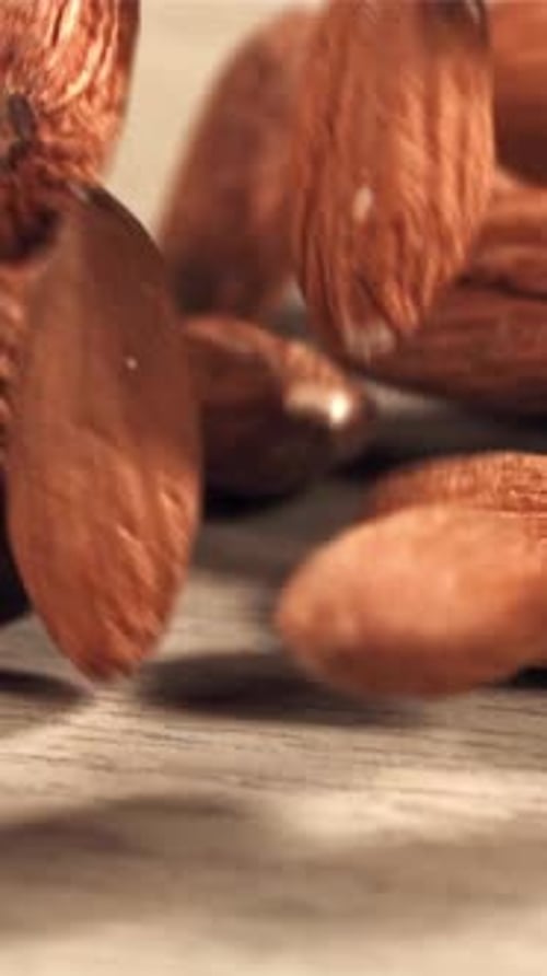 Almonds Fall on the Table Filmed on a Highspeed Camera at 1000 Fps