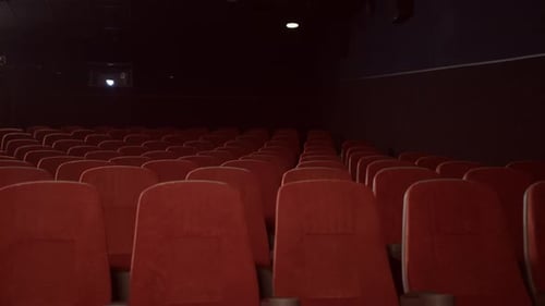 Empty Seats In Cinema Theatre. Red Seats In Movie Theatre. Empty Theatre Hall With Red Armchairs....