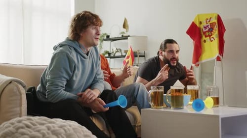 Friends Celebrating Sports Team Victory