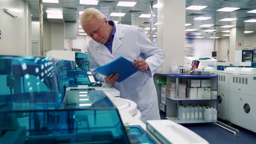 Medical Professional Examining Advanced Equipment in Bright Lab