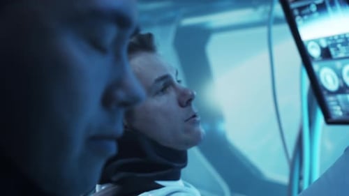 Team of Astronauts in a Space Suits Aboard the Orbital Station A Crew of Cosmonauts Piloting the