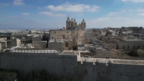 Aerial video of the walled city of St Paul's Cathedral, Malta