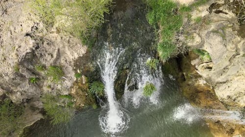 Aerial View of Beautiful Waterfall and Pond