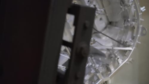 Silver Machine Rotating in Factory