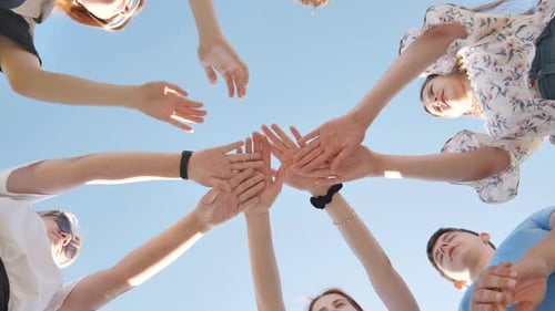 Ten Young Adults Join Hands in Unity