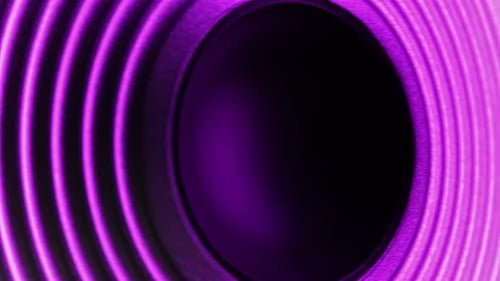 Moving Speaker In Audio System Playing Purple Light