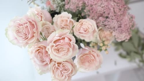 Elegant Roses and Pink Flowers Arrangement Close-Up