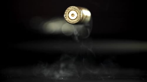 Bullet Casing Ejecting with Smoke in Slow Motion