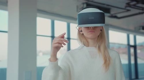 Portrait Woman Using Making Gestures Swipe When Wearing Virtual Reality Goggles Empty Building