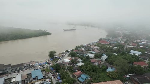 Foggy Morning Beautiful Drone View Of Sri Aman Town At Batang Lupar River, During Regatta And Pesta