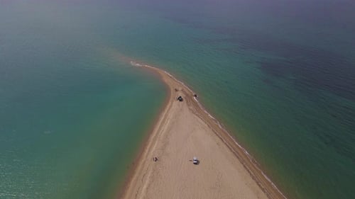 4k forward moving clip over a peninsula on the tropical beach of Epanomi, Halkidiki, Greece