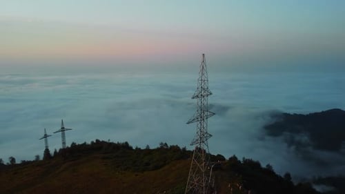 Aerial View of Mountains and Fog at Sunrise