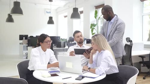 Multiethnic Business People During Meeting in Modern Office