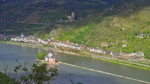 Rising aerial view over a small riverside city along the romantic Rhine Valley, Kaub, Germany
