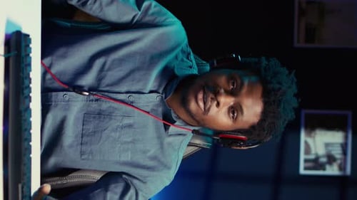 Young Adult Smiling in Gaming Chair