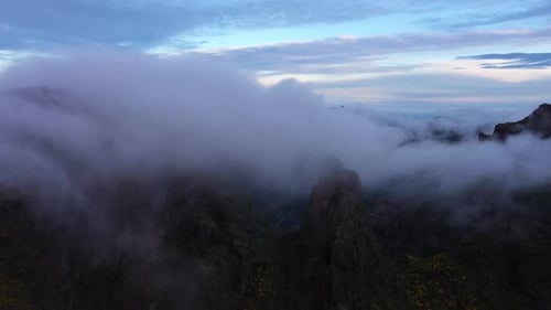Pico Do Arieiro Clouds and Mountain Peaks Aerial Drone Shot Madeira Portugal
