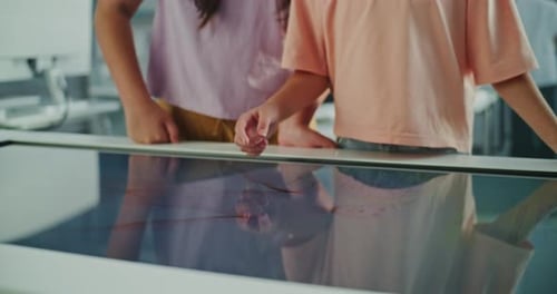 Children Interact with a Large Interactive Touchscreen Display