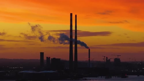 cinematic drone footage of Dublin, Ireland during an unforgettable sunset, showcasing dramatic