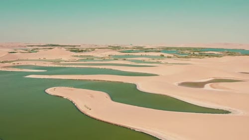 Aerial View of Desert Lakes and Sand Islands