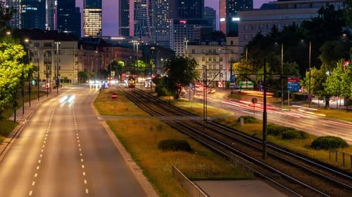 Spring Evening Traffic Flow in Mokotow, Warsaw Skyline Timelapse