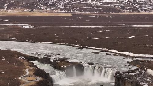 Iceland Waterfall Aerial View with Brown Hills and River