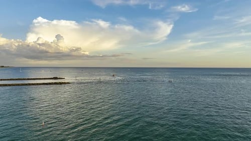 Aerial View of White Speedboats Swimming Fast on Sea Waves with Ripple Surface
