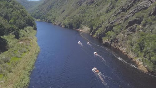 Aerial of boating on lake in South Africa for summer leisure fun and activity
